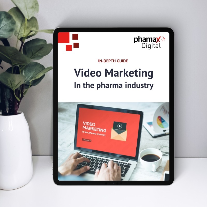Tablet displaying the cover of our whitepaper about video marketing in pharma